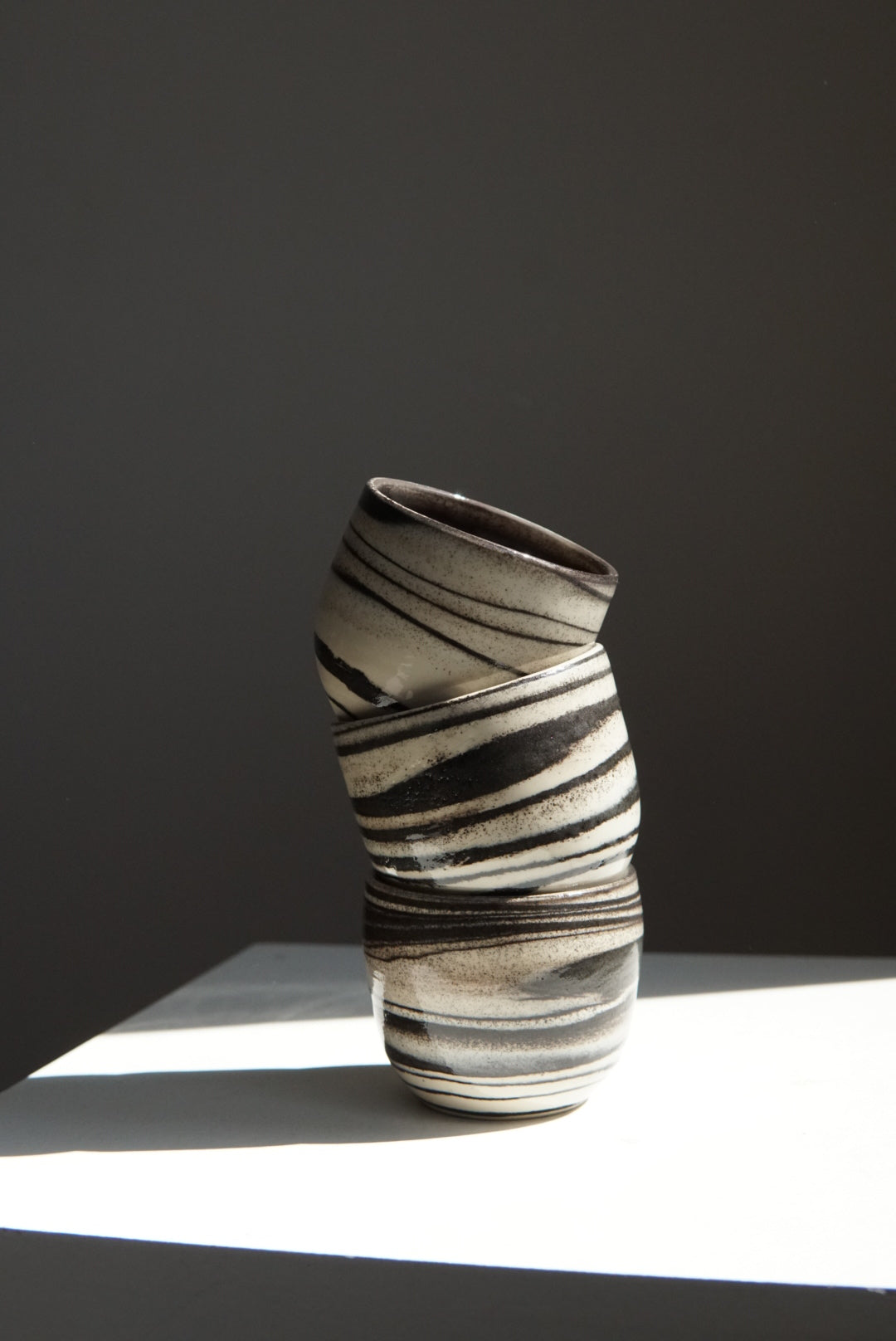 Swirl stoneware black white coffee cups GLAZED (2 pieces)